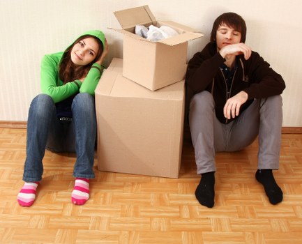 Professional movers handling office equipment during a Brompton relocation