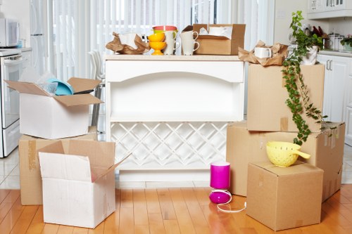 Organised house removals in Brompton with labelled boxes and moving supplies