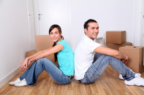 Local Brompton removal team loading furniture into a moving van