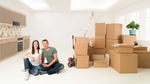 Removalists unloading home furniture at a Brompton property