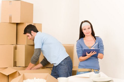 Unloading boxes into a new Brompton flat during a well-organized move
